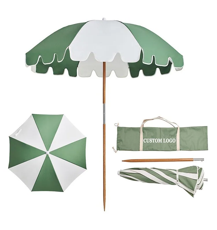 Green and white umbrella with matching carry bag and detachable lower pole